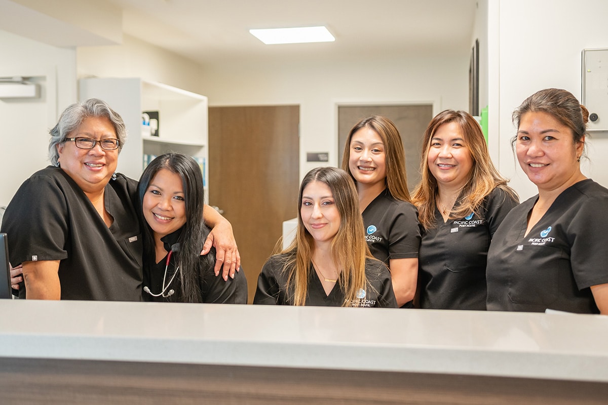several nurses at the nurse's station at Pacific Coast Post Acute